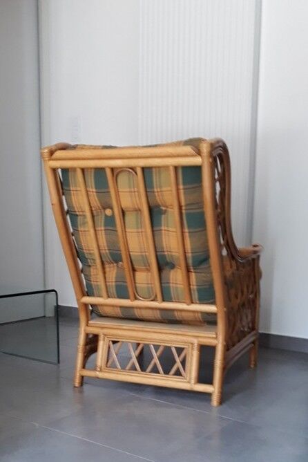 Vintage armchair in bamboo and rattan with a tartan pattern.