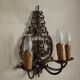 French triple wall sconce in wrought iron, early 20th century.