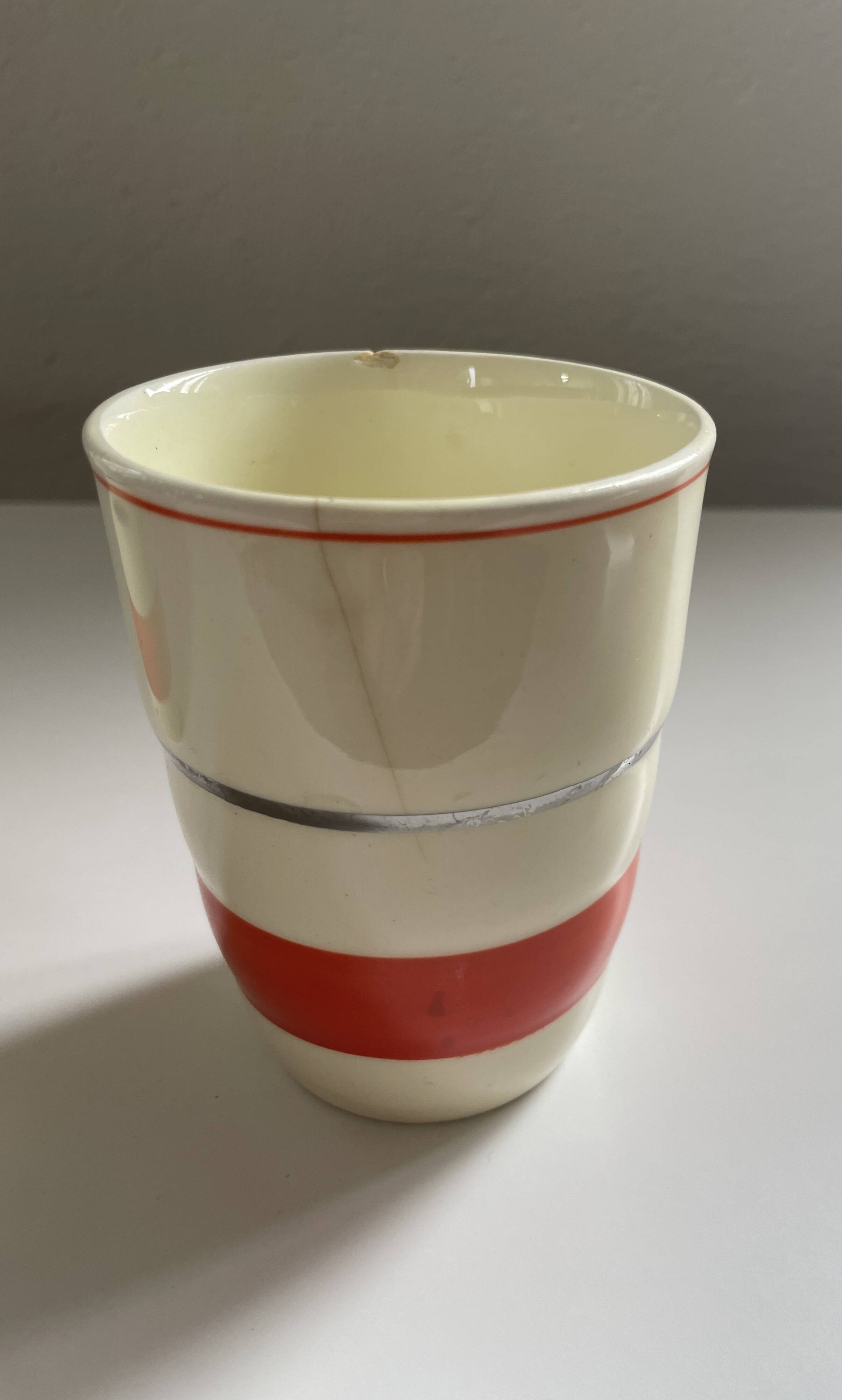 Red, white and silver porcelain jug set by Edmond Bellefroid for Robo.