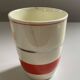 Red, white and silver porcelain jug set by Edmond Bellefroid for Robo.