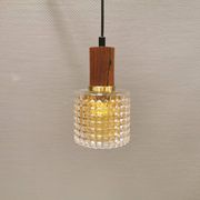 Older Swedish hanging lamp in multi-layered crystal glass with rosewood top and brass ring.