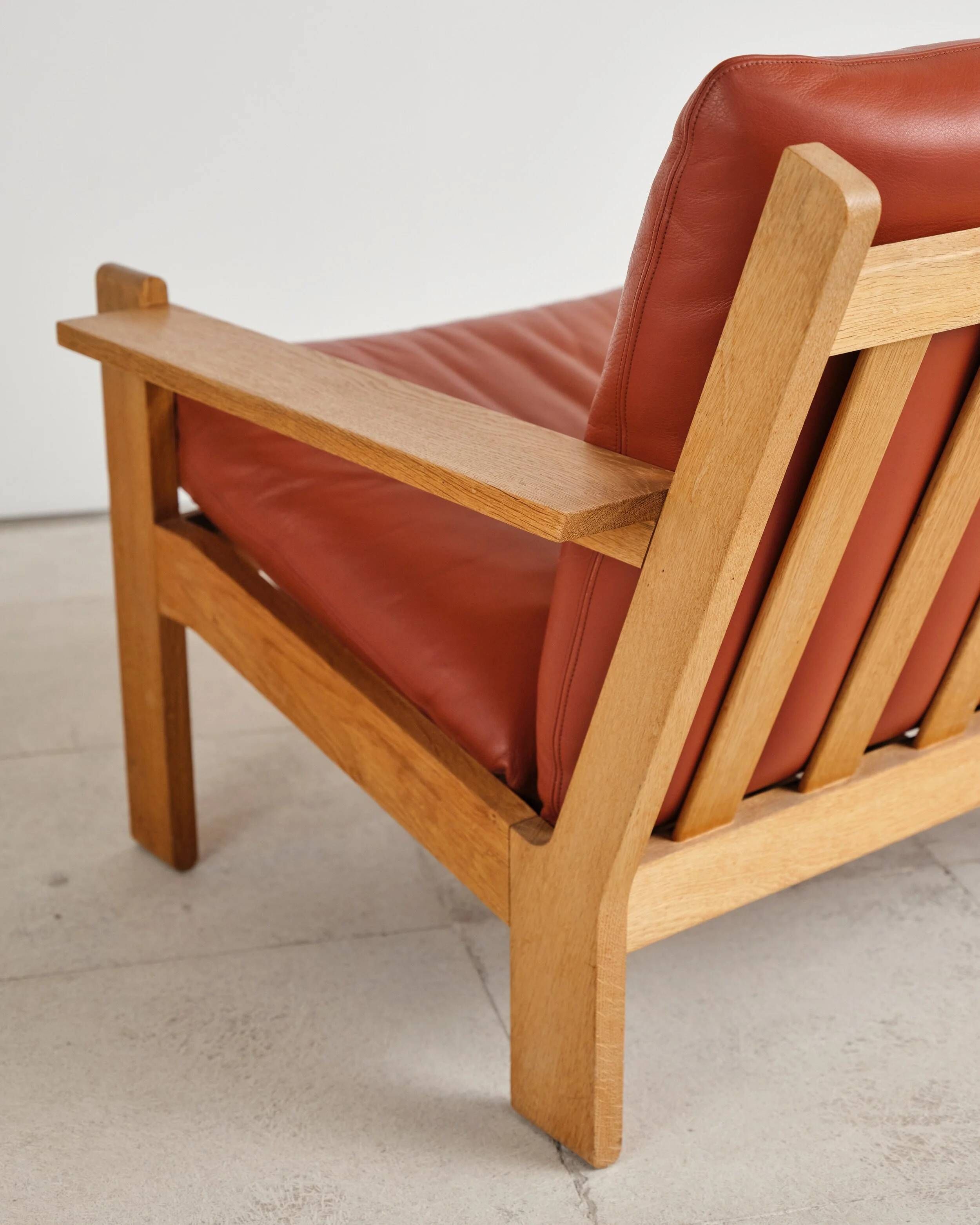 Brutalist oak and leather sofa, Tage Poulsen, 4 pieces, Denmark, 1970s.