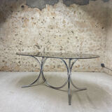 Smoked glass oval table from the 1970s.