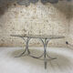 Smoked glass oval table from the 1970s.