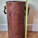 Art Deco umbrella stand in walnut with staves and ring handles, 1930.