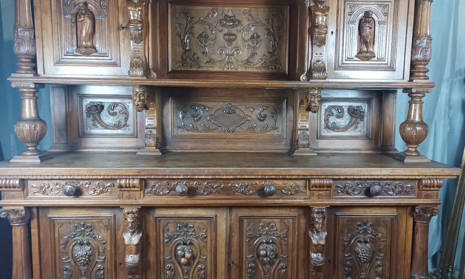 19th-century walnut buffet with two bodies.