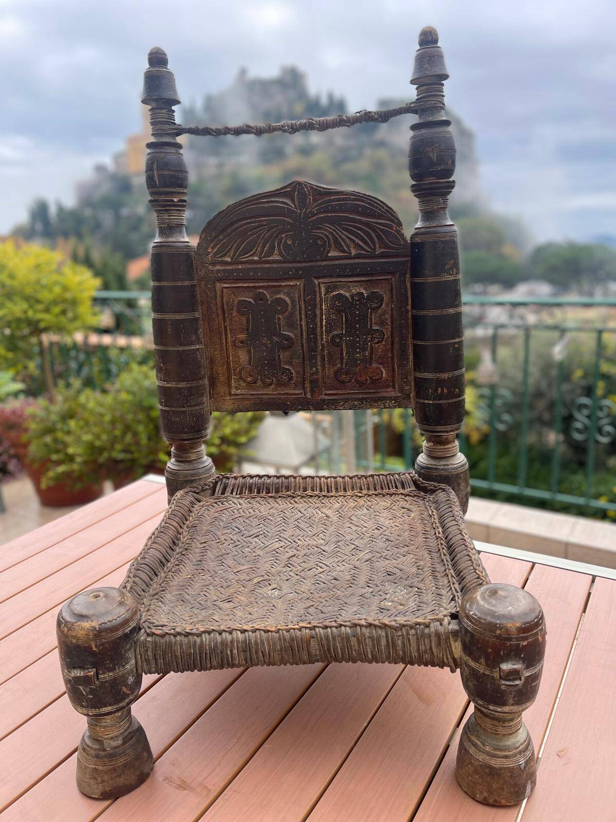 Pair of antique traditional Indian carved wooden chairs