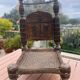 Pair of traditional Indian antique chairs in carved wood.