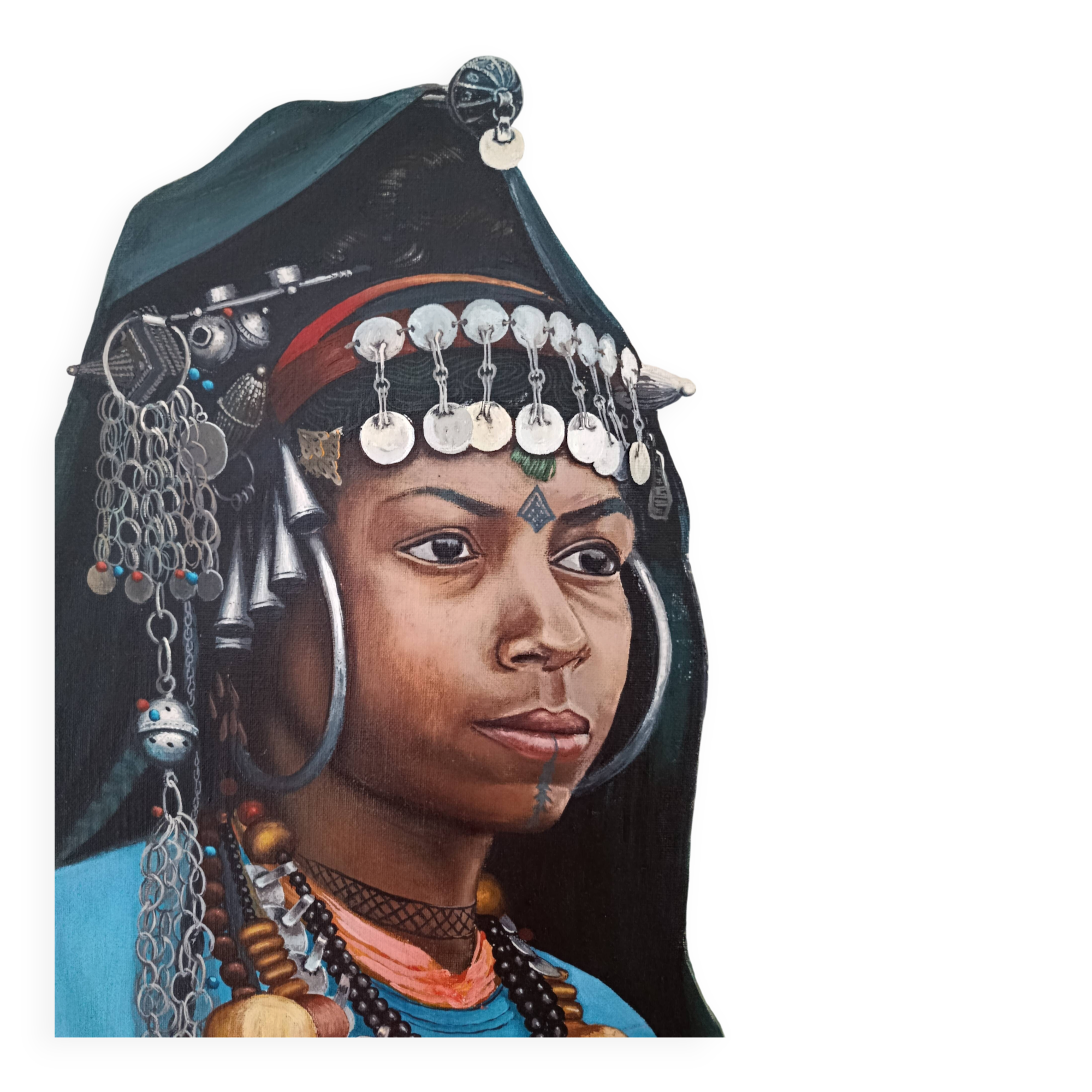 Portrait of a young Moroccan woman in traditional attire and adornments.