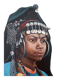 Portrait of a young Moroccan woman in traditional attire and adornments.