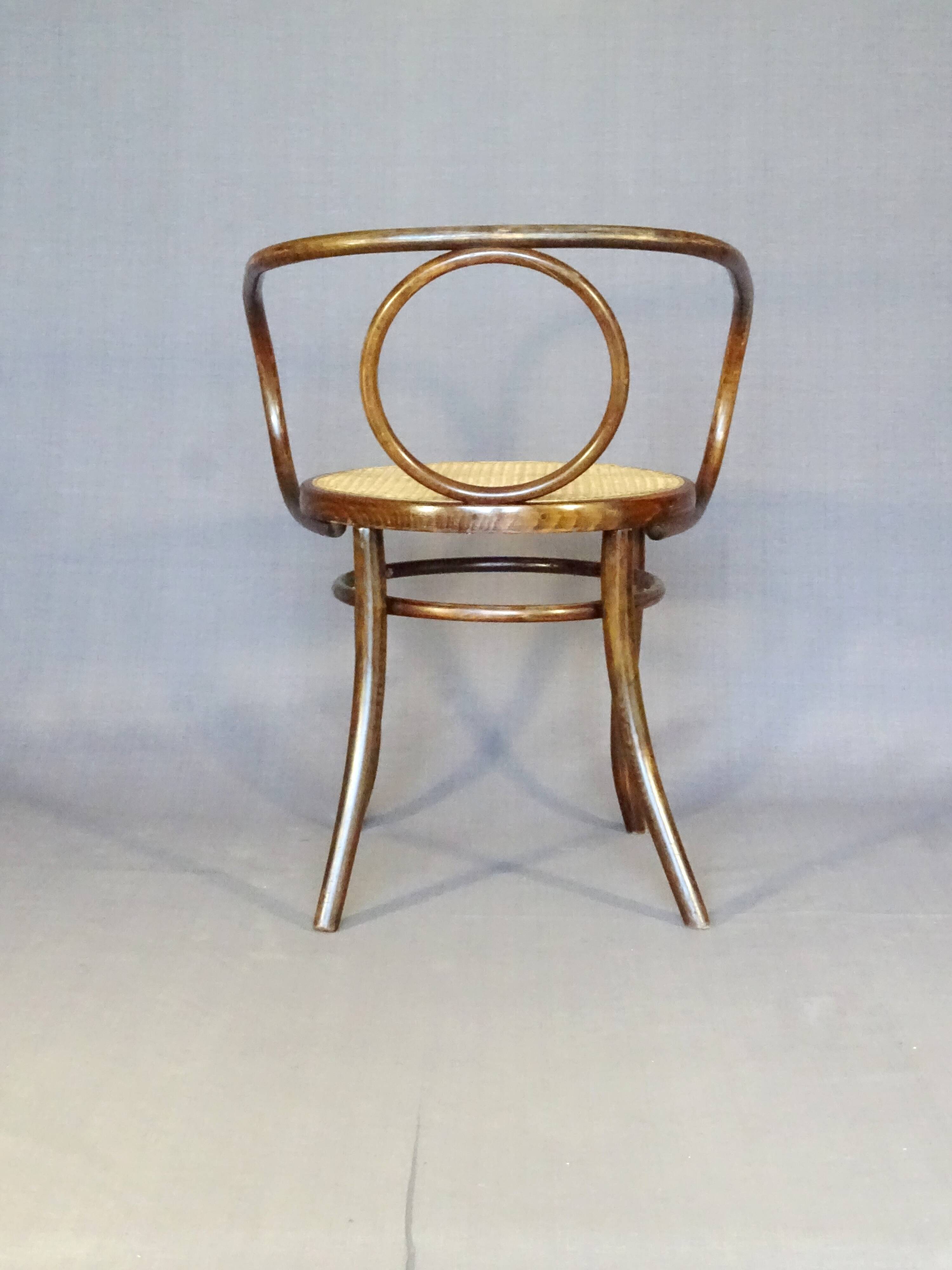 Le Corbusier armchair by Fischel 1890 caned, not Thonet.