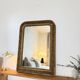 Large gilded sculpted Louis-Philippe mirror, mercury 104x77cm