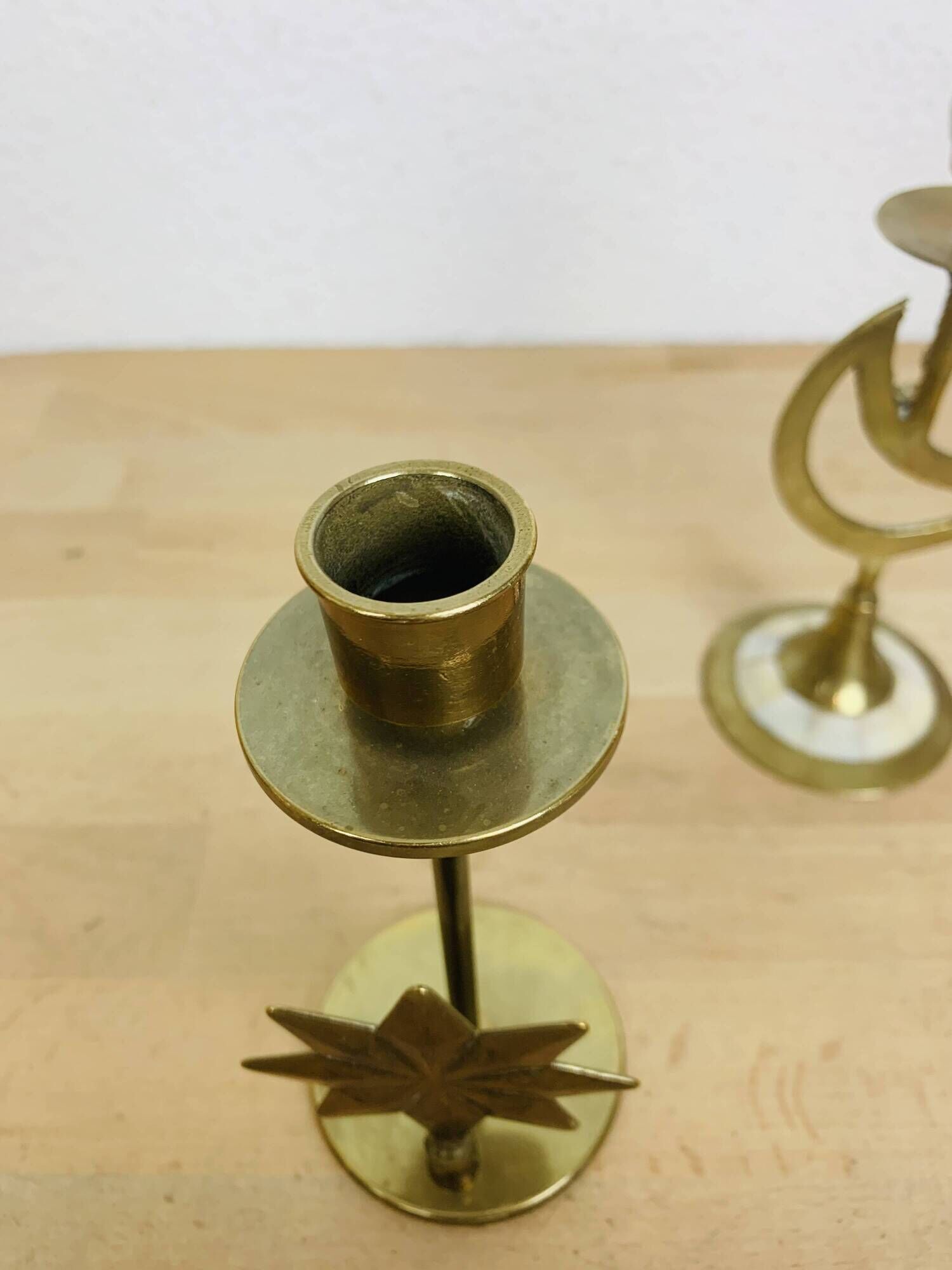Pair of mother-of-pearl brass candlesticks with moon and sun