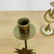 Pair of mother-of-pearl brass candlesticks with moon and sun