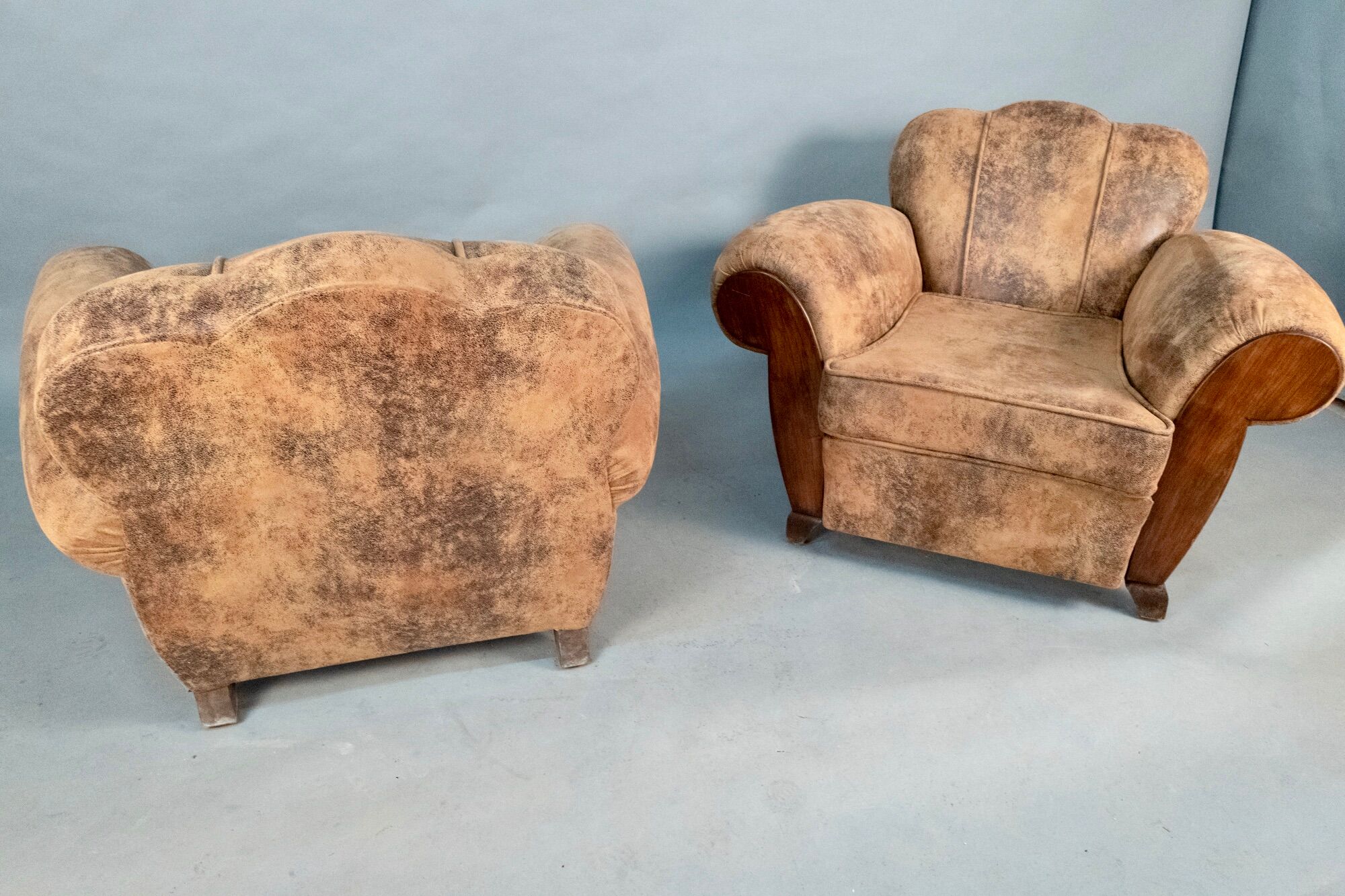 Pair of club deco armchairs