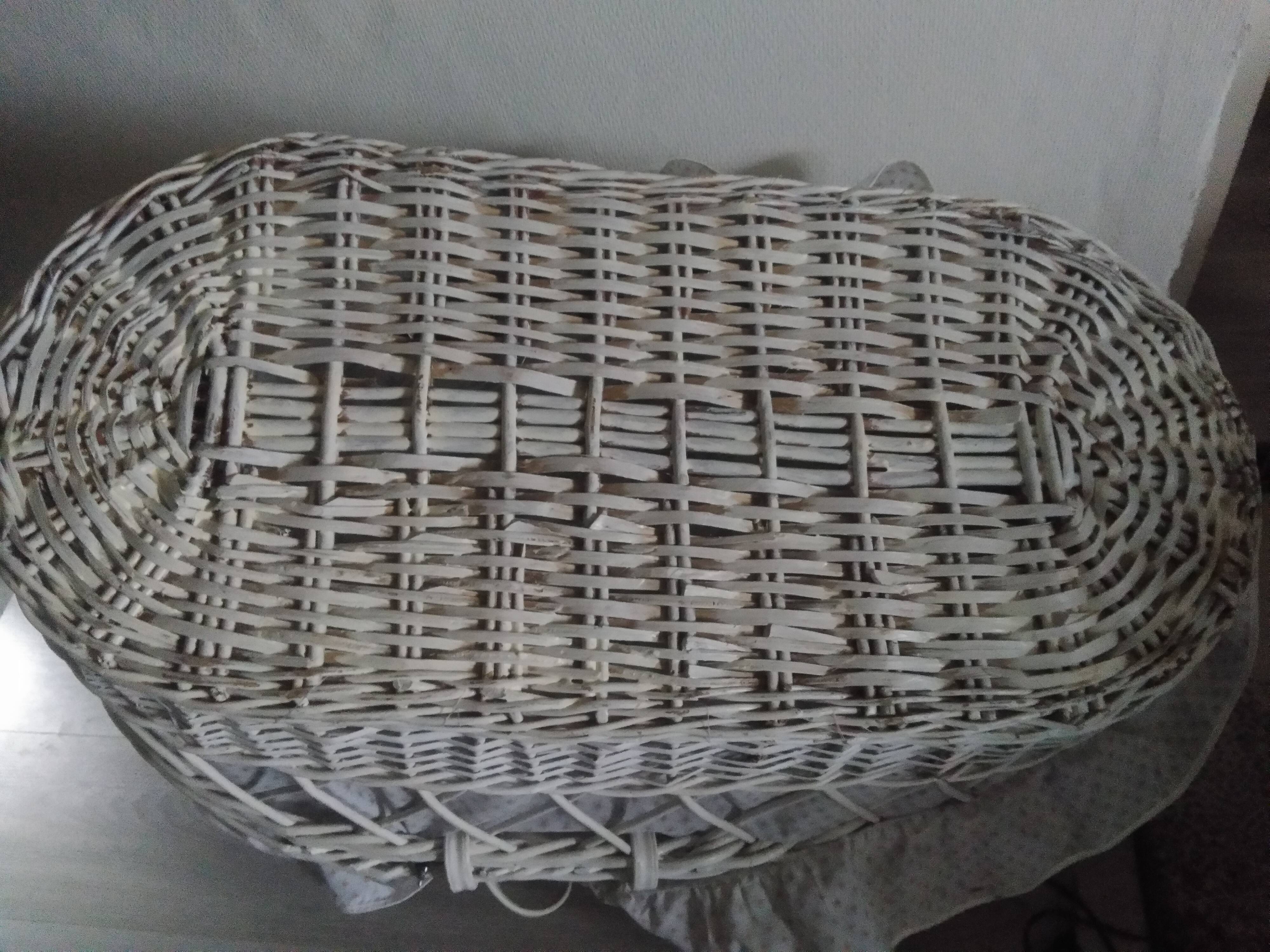 White rattan bassinet