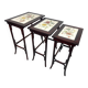Nested tables in curved wood with ceramic top by Thonet.