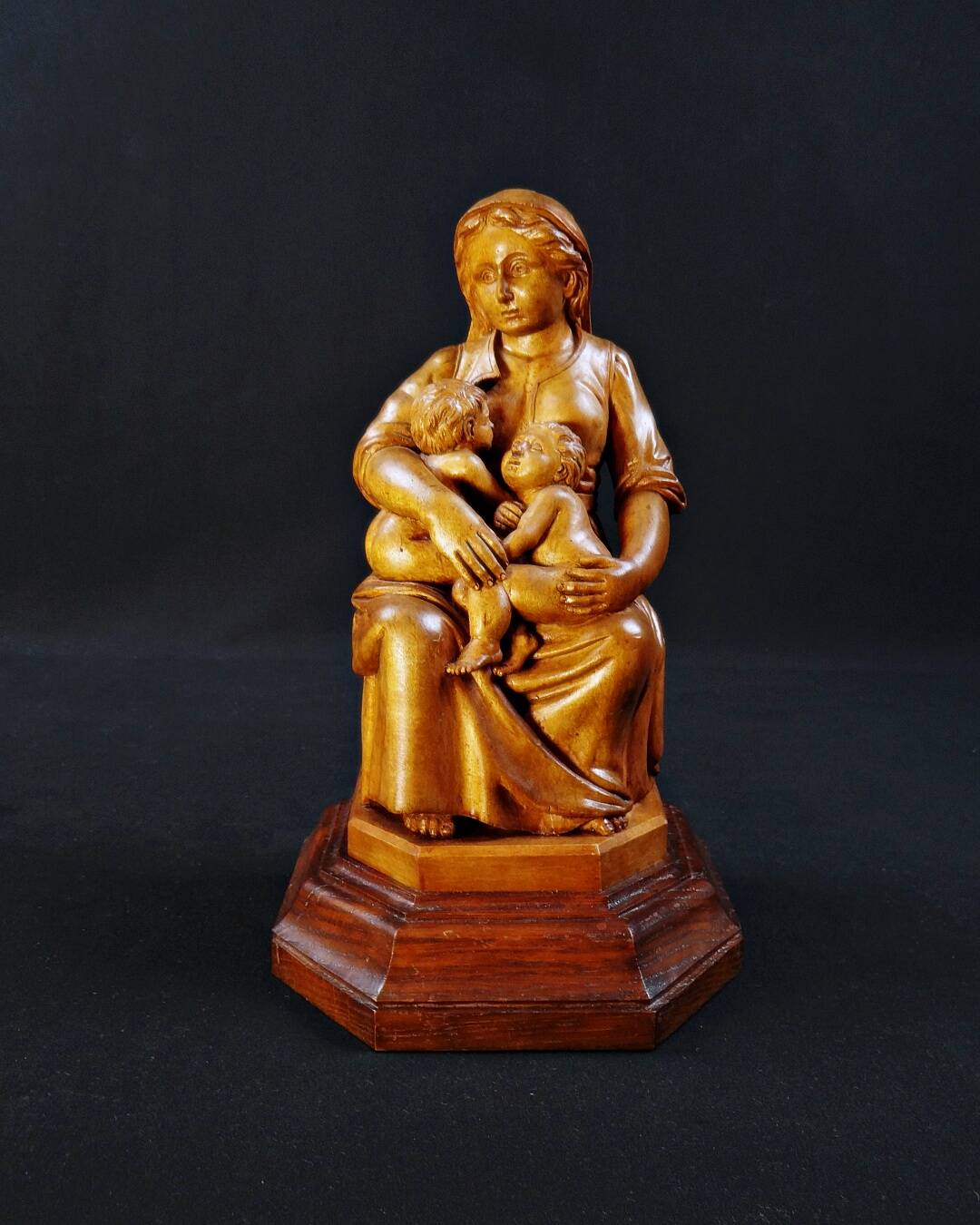 Virgin breastfeeding the Child Jesus and Saint John religious sculpture wood