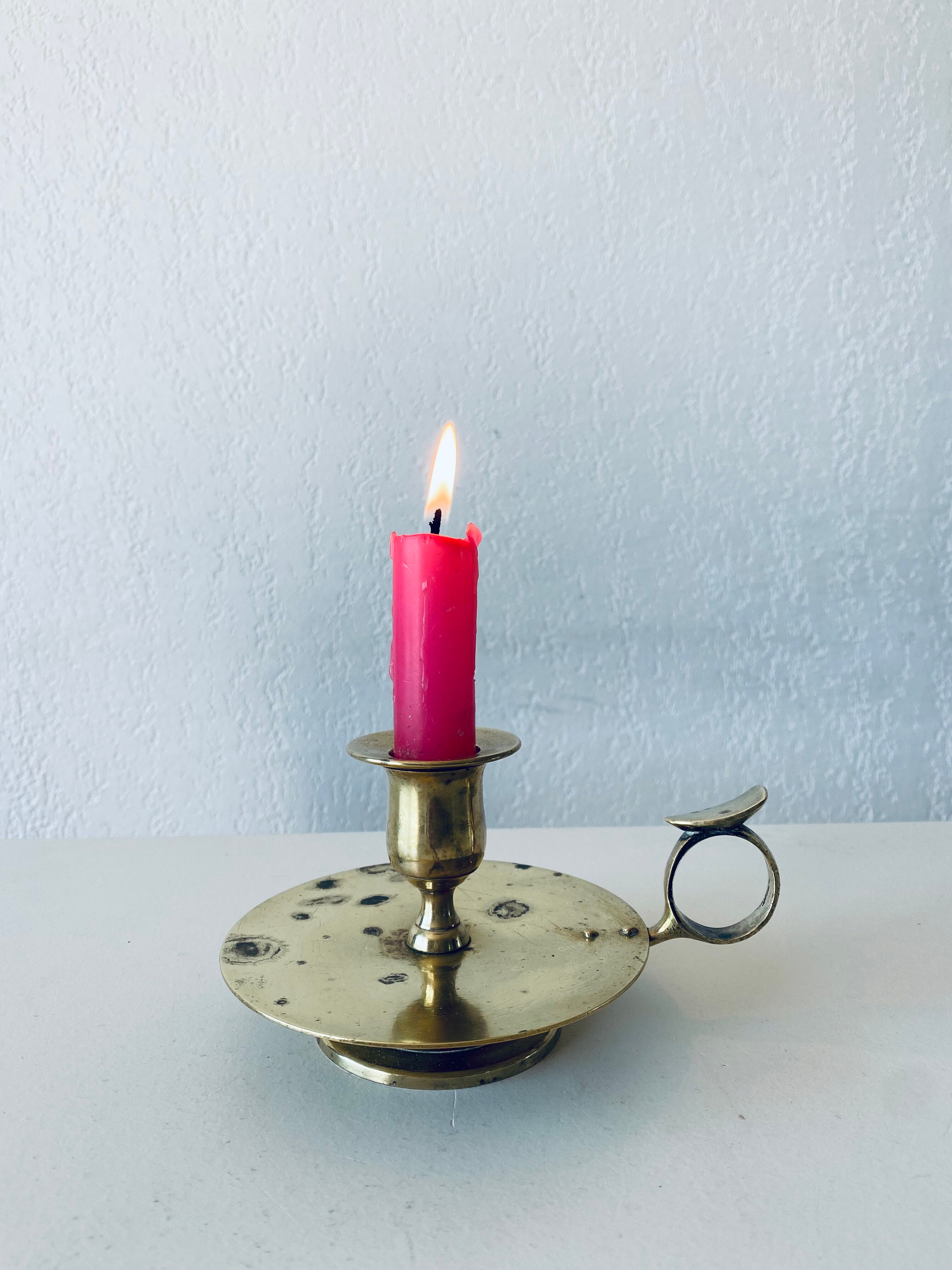 Old candle holder with handle