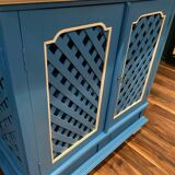 Large colonial style wooden cabinet with latticework