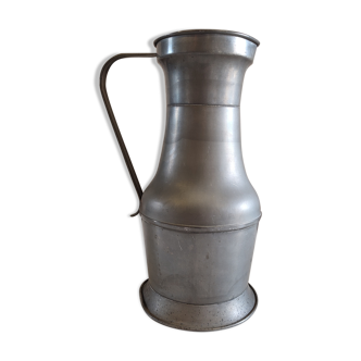 Large copper pitcher and old tin