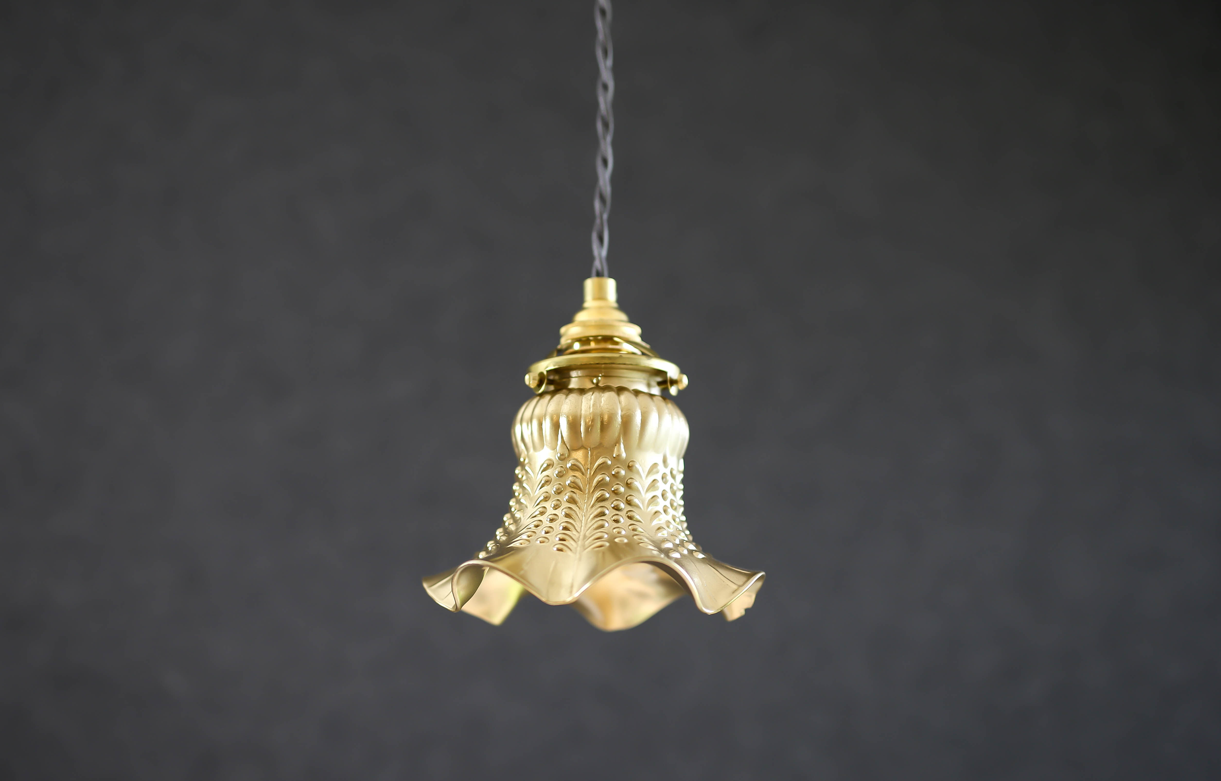 Old tulip suspension painted gold with new brass