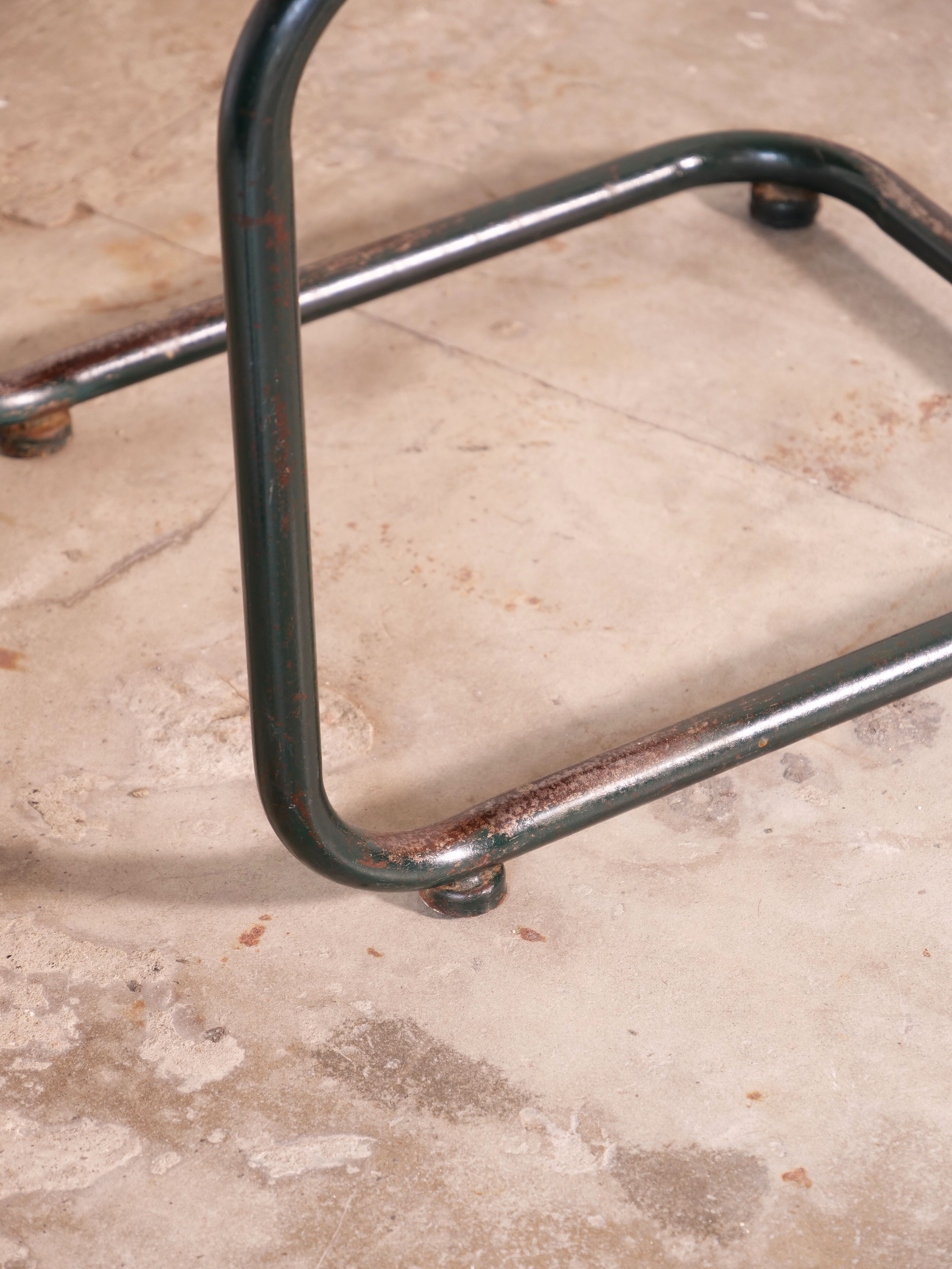 Desk with bauhaus style tubular steel chair