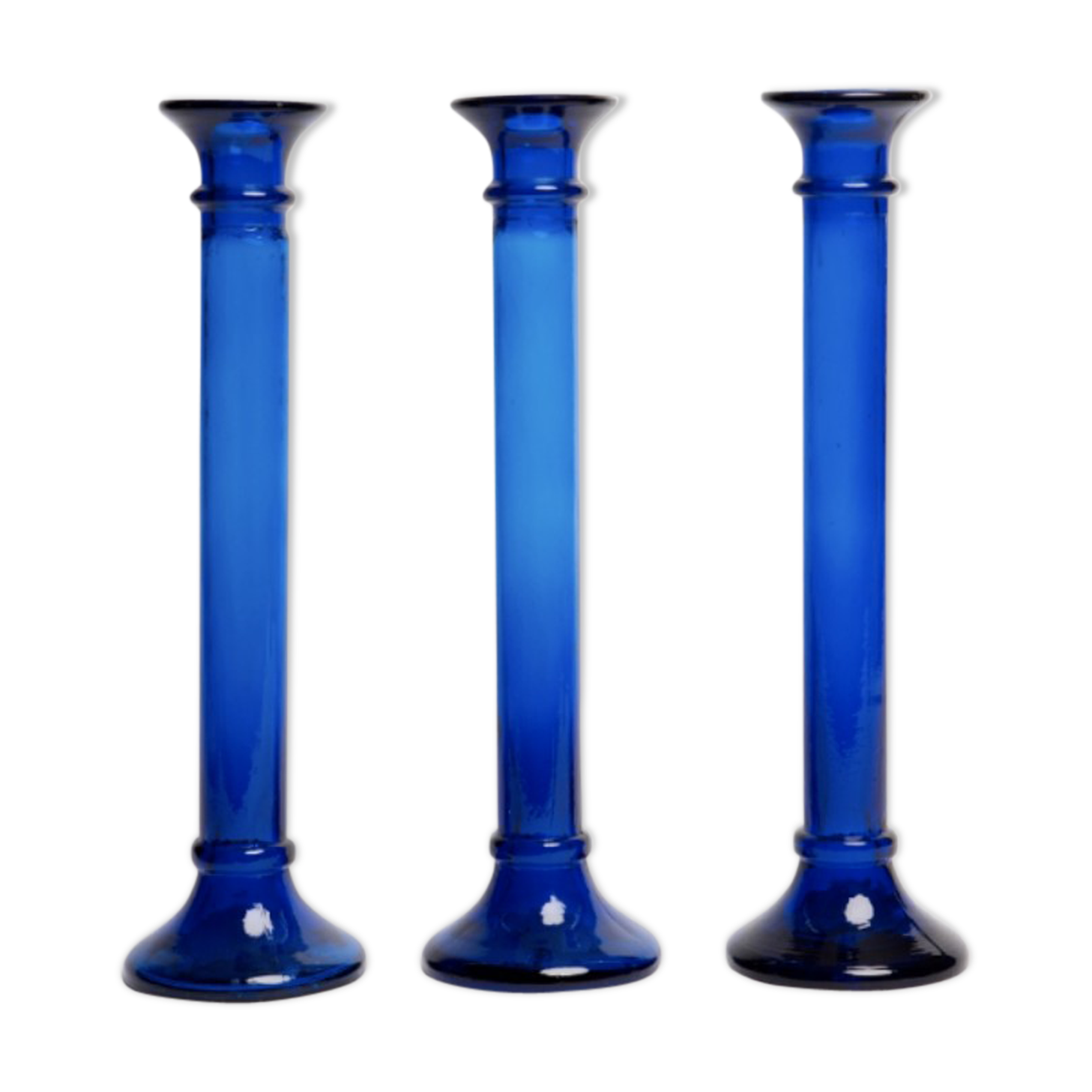 Three cobalt blue candlesticks
