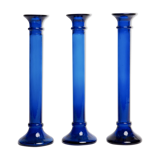 Three cobalt blue candlesticks