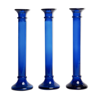 Three cobalt blue candlesticks