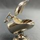 Individual ashtray with metal clasp