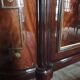 Louis XVI style display cabinet in varnished mahogany wood.