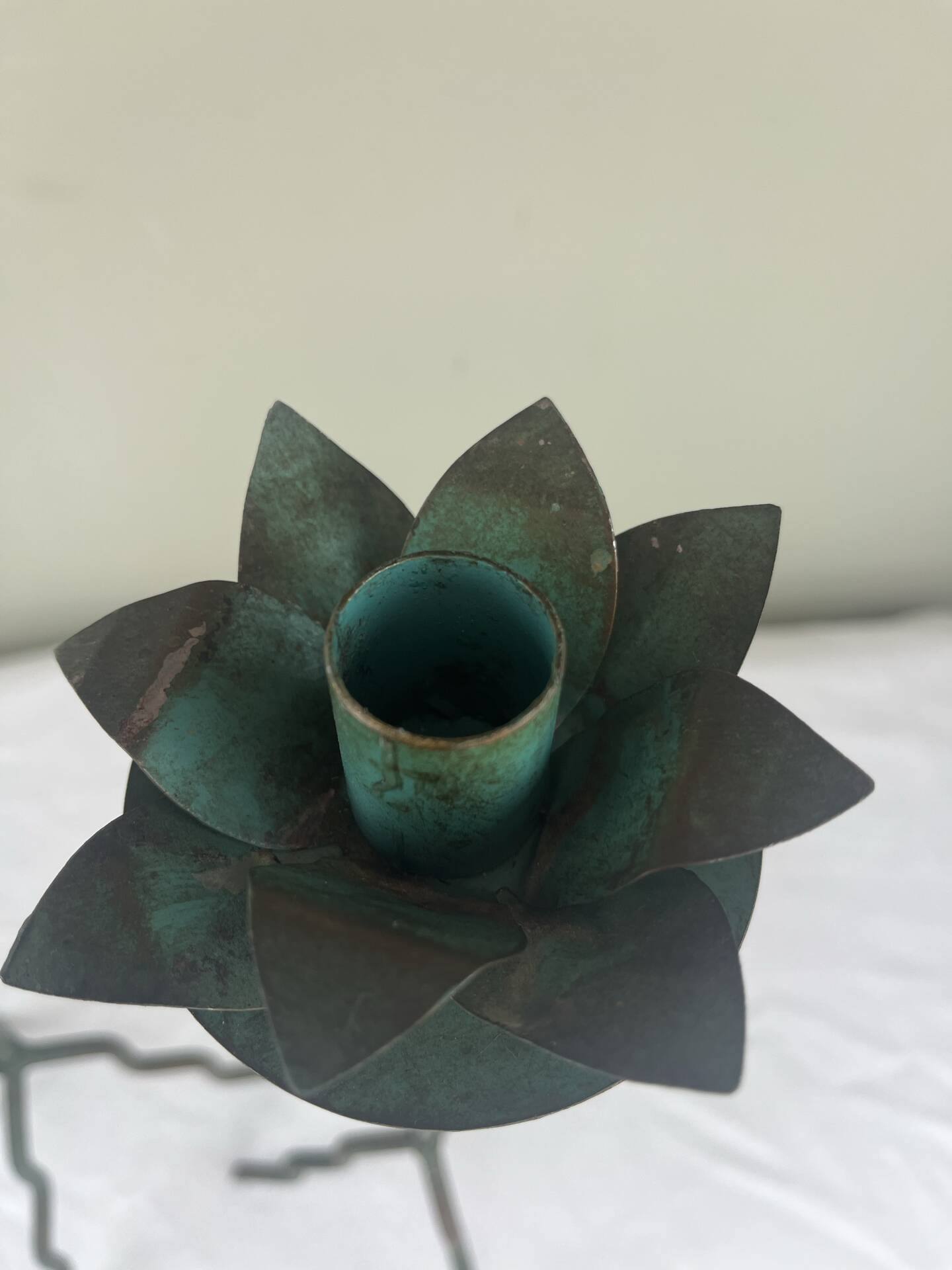Sculptural candle holder trio
