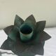 Sculptural candle holder trio