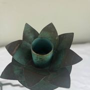 Sculptural candle holder trio