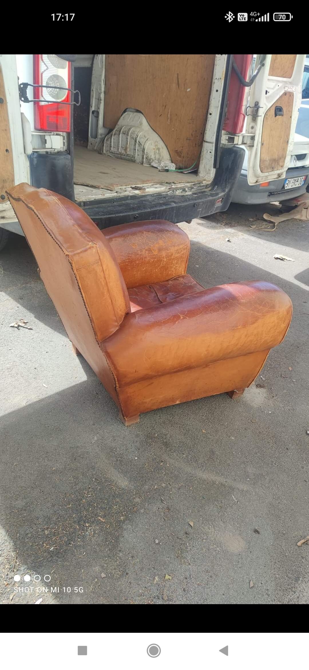 Pair of club chairs with moustache-shaped handles in Havana leather, in their original condition, circa 1930
