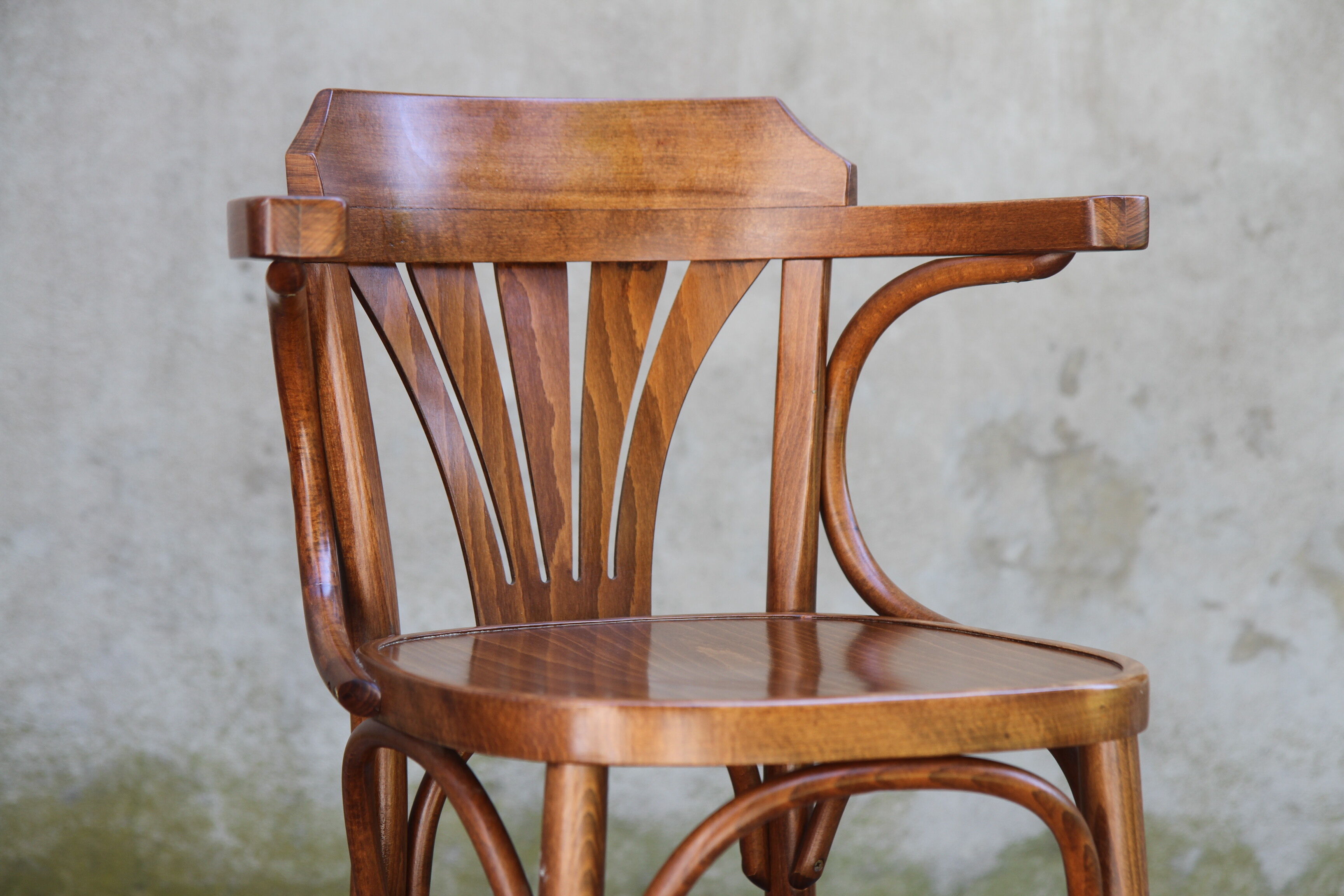 High curved wooden bar chair