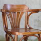 High curved wooden bar chair