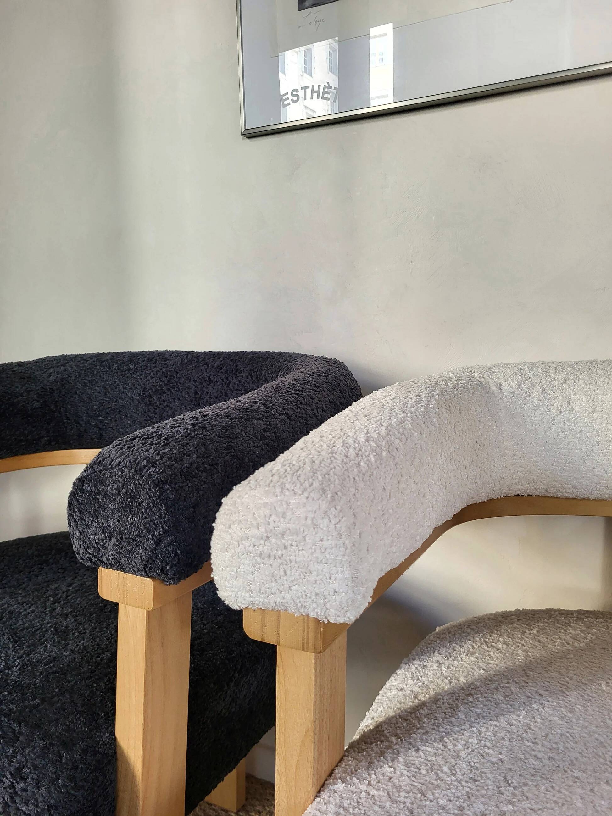 Contemporary armchair in wood and bouclé fabric