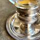 Glass and silver-plated metal tealight holder