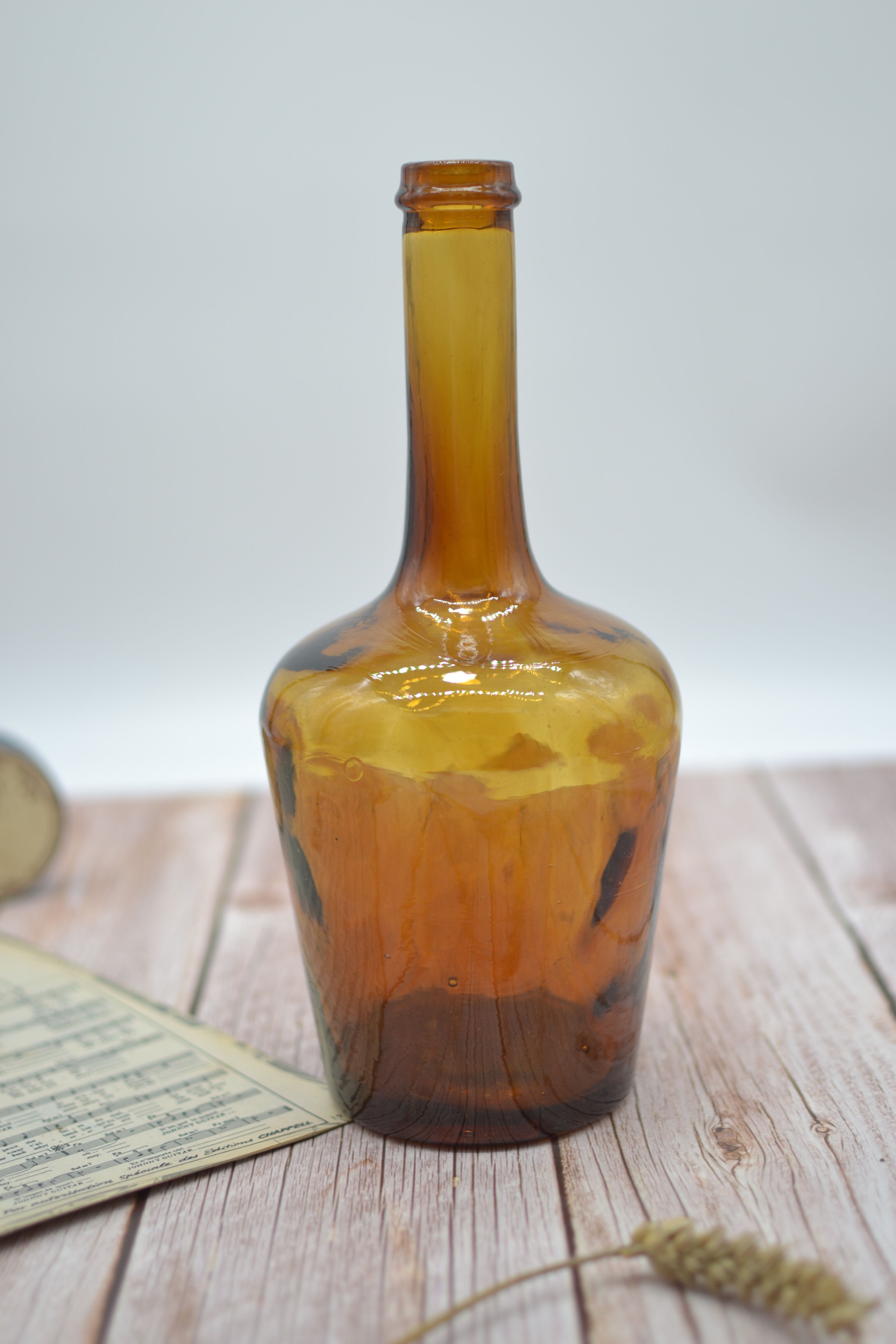 Lady jeanne in amber glass irregular appearance