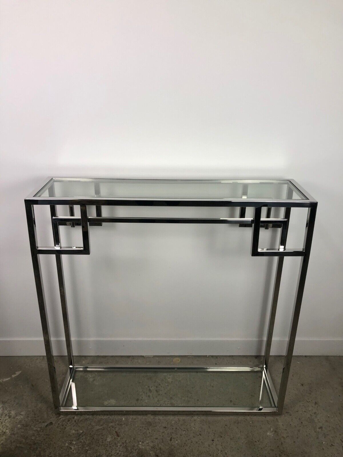 Art Deco style console in chromed metal with glass top