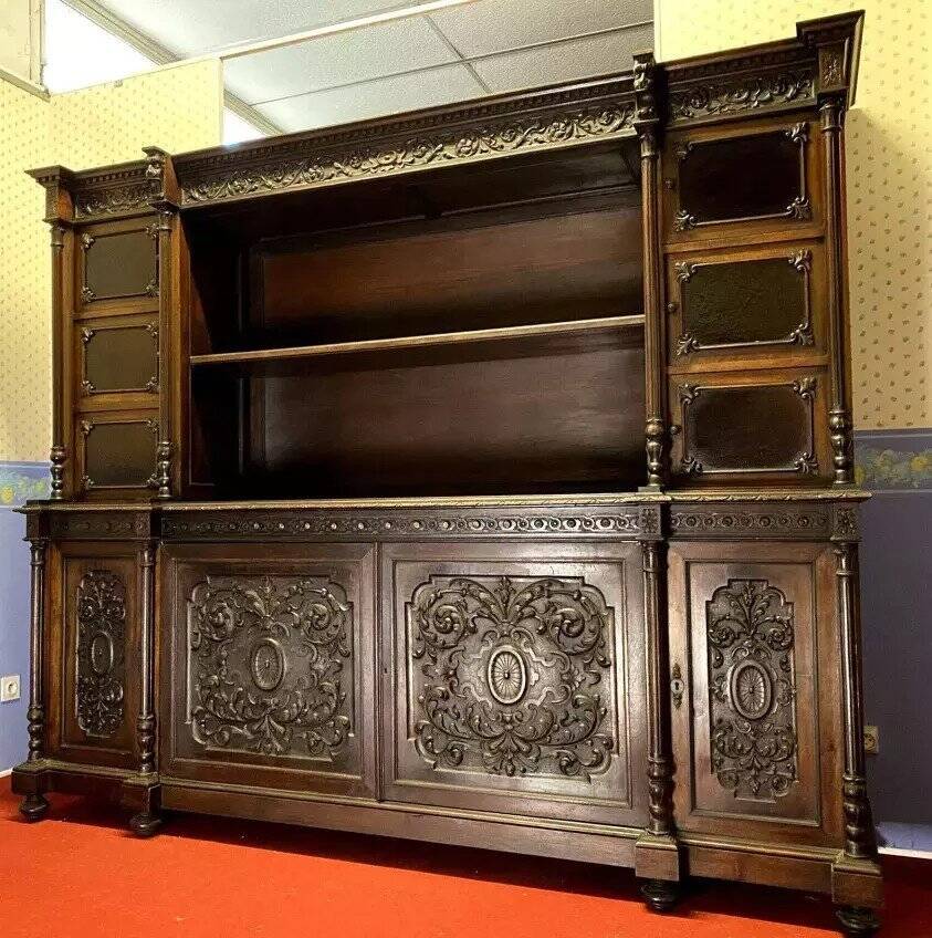Renaissance-style sideboard, entirely made of walnut and richly carved.