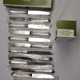set of 12 silver metal dessert knives from Christofle model "spartours"