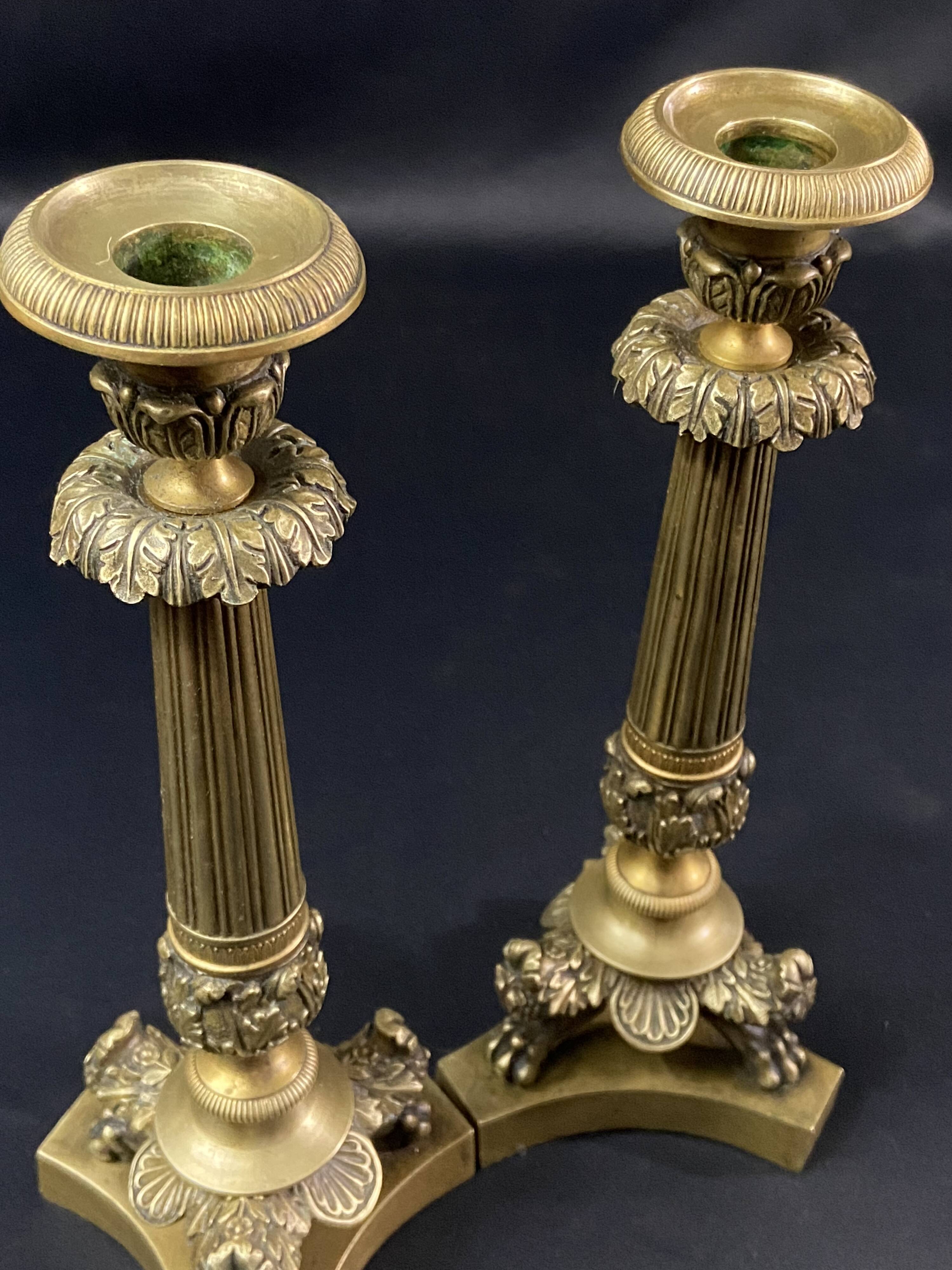 Pair of gilt and chiseled bronze candlesticks from the Restoration period