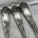 Set of 12 small silver-plated metal spoons in Art Nouveau style.