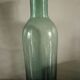 Bouteille, vase en verre vert