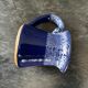 Small enamelled earthenware milk jug