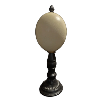 Cabinet of Curiosities ostrich egg Struthio camelus on pedestal