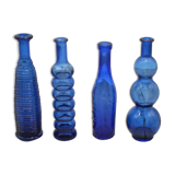 Set of 4 blue bottles of decoration